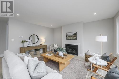 #14 -2835 Sheffield Pl, London, ON - Indoor Photo Showing Living Room With Fireplace