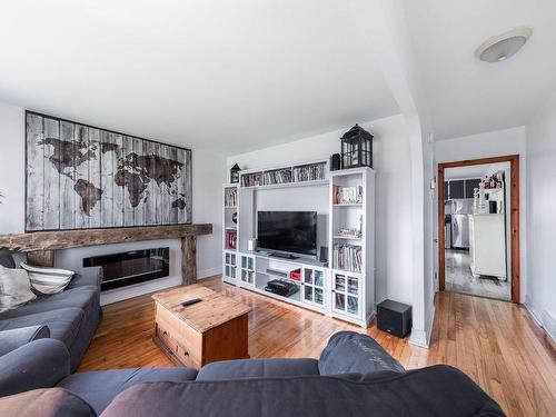 Living room - 985 Boul. D'Iberville, Saint-Jean-Sur-Richelieu, QC - Indoor Photo Showing Living Room With Fireplace