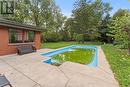 13961 Riverside Drive, Tecumseh, ON  - Outdoor With In Ground Pool With Backyard 