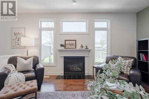1648 Portrush Way, London, ON - Indoor Photo Showing Living Room With Fireplace