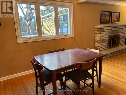 1874 Rideau Garden Drive, Ottawa, ON - Indoor Photo Showing Dining Room With Fireplace