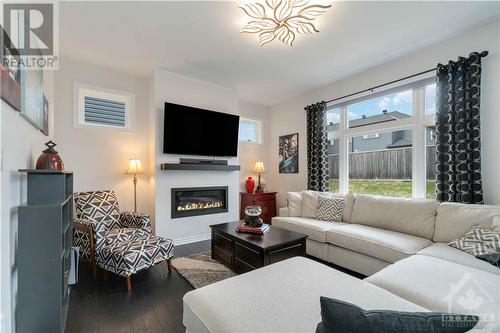 604 Enclave Lane, Clarence-Rockland, ON - Indoor Photo Showing Living Room With Fireplace