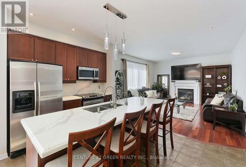 39 Clamerten Rd, Whitchurch-Stouffville, ON - Indoor Photo Showing Kitchen With Fireplace With Double Sink With Upgraded Kitchen