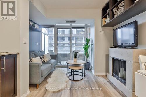 #416 -65 East Liberty St, Toronto, ON - Indoor Photo Showing Other Room With Fireplace