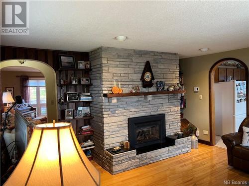 27 Hillhurst Drive, Quispamsis, NB - Indoor Photo Showing Living Room With Fireplace