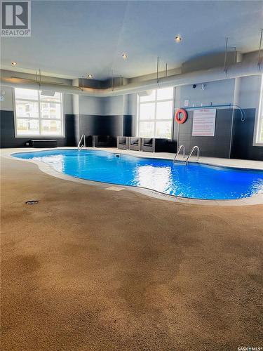 213 1545 Neville Drive, Regina, SK - Indoor Photo Showing Other Room With In Ground Pool