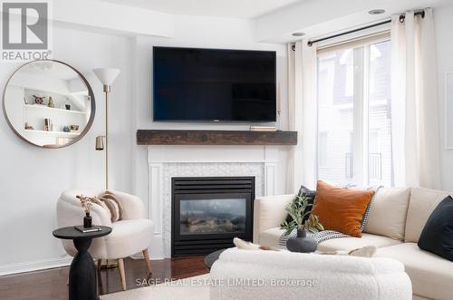 #1514 -26 Laidlaw St, Toronto, ON - Indoor Photo Showing Living Room With Fireplace
