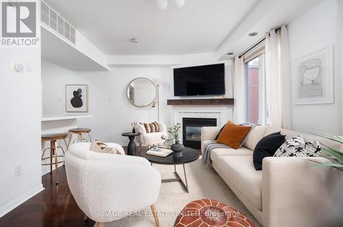 #1514 -26 Laidlaw St, Toronto, ON - Indoor Photo Showing Living Room With Fireplace