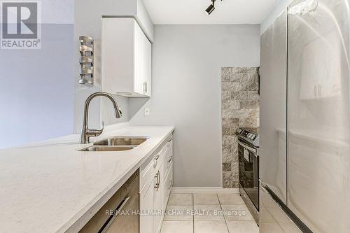 #112 -300 Ray Lawson Blvd, Brampton, ON - Indoor Photo Showing Kitchen With Double Sink