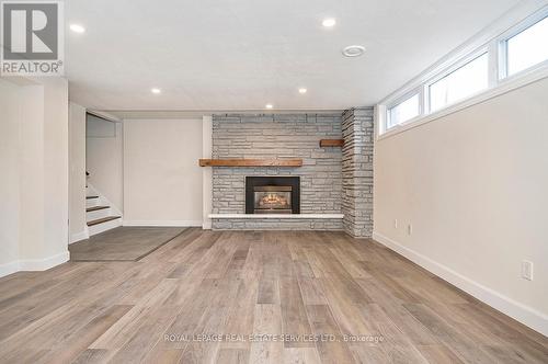#Lower -4 Sandra Crt, Hamilton, ON - Indoor Photo Showing Living Room With Fireplace
