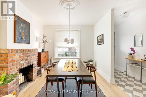 17 Indian Road Crescent, Toronto, ON - Indoor Photo Showing Dining Room With Fireplace