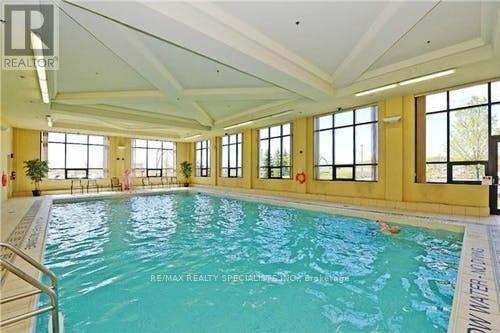 311 - 60 Via Rosedale, Brampton, ON - Indoor Photo Showing Other Room With In Ground Pool
