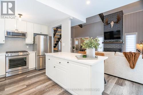 22 Slalom Dr, Oro-Medonte, ON - Indoor Photo Showing Kitchen With Fireplace With Upgraded Kitchen