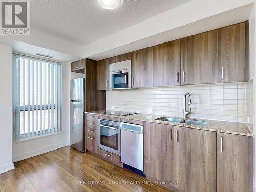 #1403 -255 Village Green Sq, Toronto, ON - Indoor Photo Showing Kitchen With Double Sink With Upgraded Kitchen