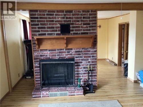 107 Queensway Street, Milltown, NB - Indoor Photo Showing Other Room With Fireplace