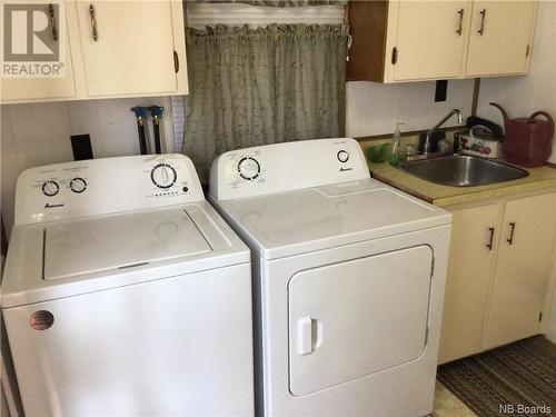 107 Queensway Street, Milltown, NB - Indoor Photo Showing Laundry Room
