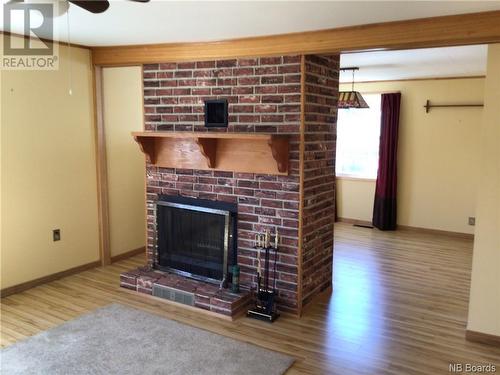 107 Queensway Street, Milltown, NB - Indoor With Fireplace