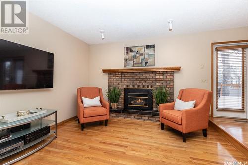 735 Wakaw Terrace, Saskatoon, SK - Indoor Photo Showing Living Room With Fireplace