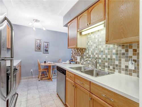 10 Woodman Drive S|Unit #304, Hamilton, ON - Indoor Photo Showing Kitchen With Double Sink
