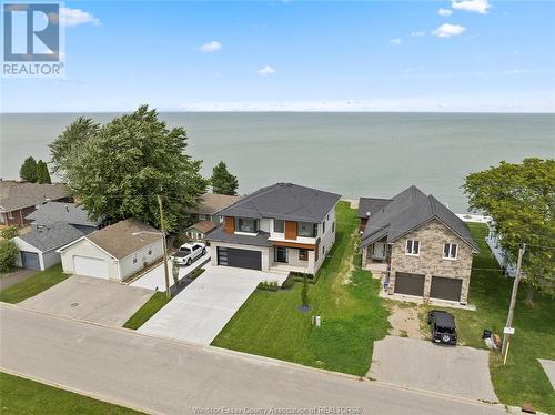 1252 Shoreline, Lakeshore, ON - Outdoor With Body Of Water With Facade