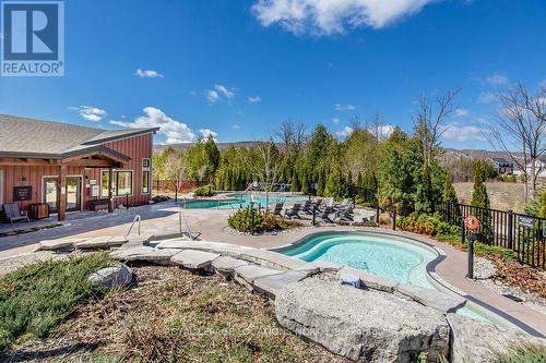 #107 -11 Beausoleil Lane, Blue Mountains, ON - Outdoor With In Ground Pool With Deck Patio Veranda
