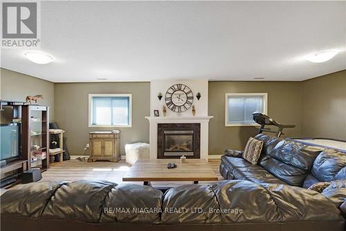 7228 Kelly Dr, Niagara Falls, ON - Indoor Photo Showing Other Room With Fireplace