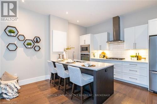 #100 -1705 Fiddlehead Pl, London, ON - Indoor Photo Showing Kitchen With Upgraded Kitchen