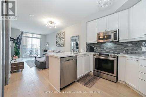 #1004 -70 Absolute Ave, Mississauga, ON - Indoor Photo Showing Kitchen With Stainless Steel Kitchen With Double Sink With Upgraded Kitchen