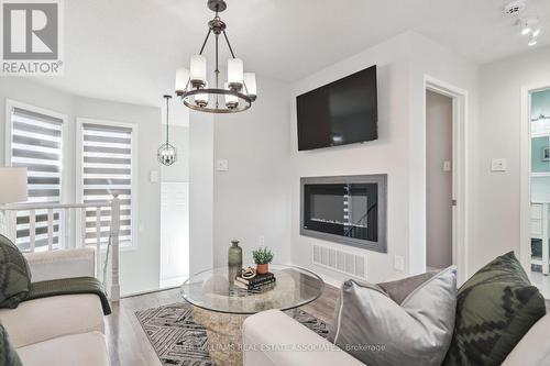 14 Silkwood Cres, Brampton, ON - Indoor Photo Showing Other Room With Fireplace