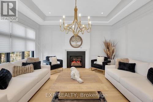 125 Clearview Hts, King, ON - Indoor Photo Showing Living Room With Fireplace