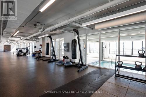 #4818 -30 Shore Breeze Dr, Toronto, ON - Indoor Photo Showing Gym Room