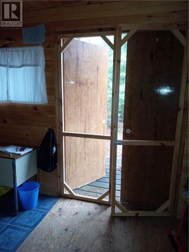 Bunkie has screened doors - 61 River Lane, Madawaska, ON -  Photo Showing Other Room