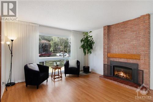 10 Selwyn Crescent, Kanata, ON - Indoor Photo Showing Living Room With Fireplace