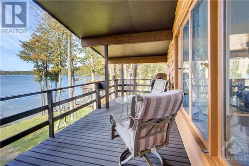 1020C Young Lane, Ompah, ON - Outdoor With Body Of Water With Deck Patio Veranda With Exterior