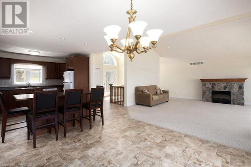 115 South Shores Road, Grey Highlands, ON - Indoor Photo Showing Dining Room With Fireplace