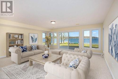 This photo has been virtually staged. - 115 South Shores Road, Grey Highlands, ON - Indoor Photo Showing Living Room