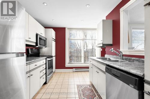 #407 -460 Wellington St, London, ON - Indoor Photo Showing Kitchen With Double Sink