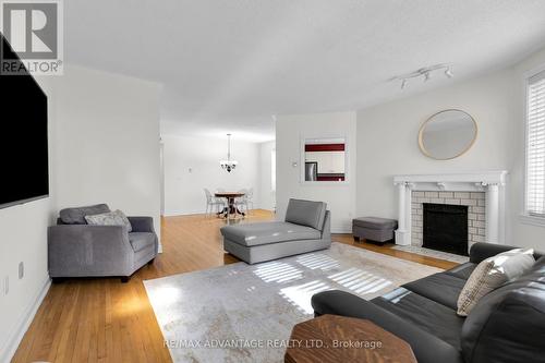 #407 -460 Wellington St, London, ON - Indoor Photo Showing Living Room With Fireplace