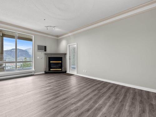 504-712 Sahali Terrace, Kamloops, BC - Indoor Photo Showing Living Room With Fireplace