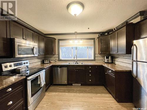 305 1St Street E, Meadow Lake, SK - Indoor Photo Showing Kitchen With Stainless Steel Kitchen