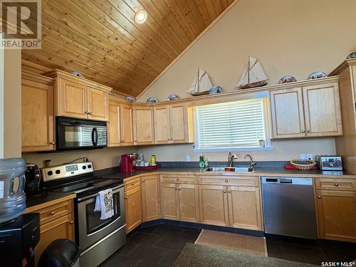 49 Taylor Street, Katepwa Beach, SK - Indoor Photo Showing Kitchen With Double Sink