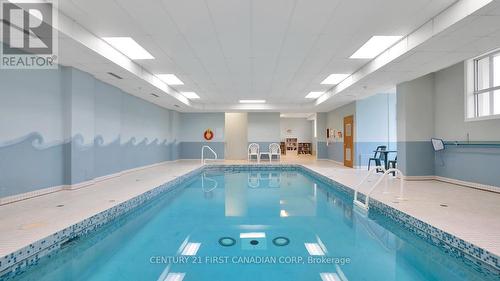 #203 -1180 Commissioners Rd W, London, ON - Indoor Photo Showing Other Room With In Ground Pool