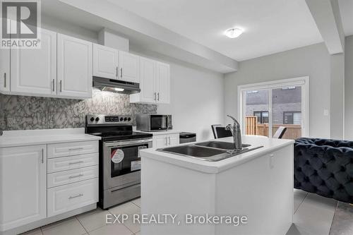 #13 -520 Grey St, Brantford, ON - Indoor Photo Showing Kitchen With Double Sink