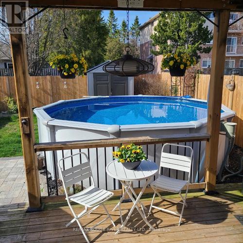 242 Sutherland Cres, Cobourg, ON - Outdoor With Above Ground Pool With Deck Patio Veranda