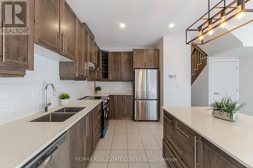 #48 -30 Times Square Blvd, Hamilton, ON - Indoor Photo Showing Kitchen With Stainless Steel Kitchen With Double Sink With Upgraded Kitchen