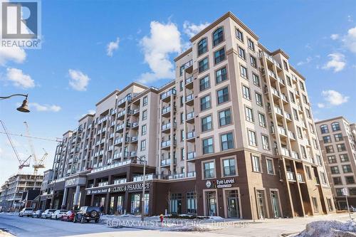 607 - 2486 Old Bronte Road W, Oakville, ON - Outdoor With Balcony With Facade