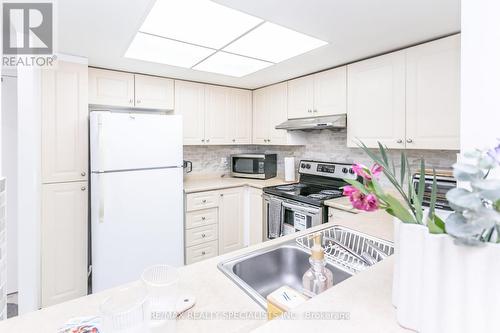 #1105 -325 Webb Dr, Mississauga, ON - Indoor Photo Showing Kitchen With Double Sink