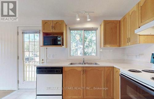 57 Head St, Kawartha Lakes, ON - Indoor Photo Showing Kitchen With Double Sink