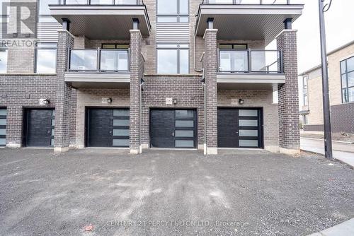 38 Emmas Way, Whitby, ON - Outdoor With Balcony With Facade