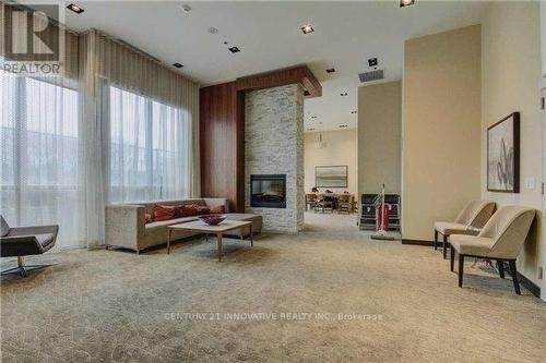 3703 - 50 Town Centre Court, Toronto, ON - Indoor With Fireplace